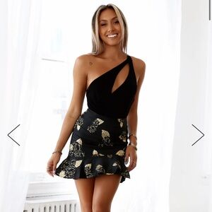 Black one shoulder body suit